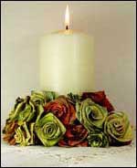 photo of woven flax flowers around a candle