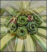 photo of an arrangement of woven tropical roses